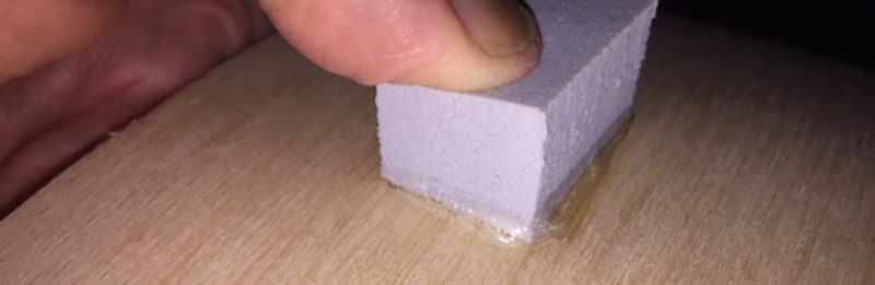 A piece of rubber glued to a rotary board with too much glue