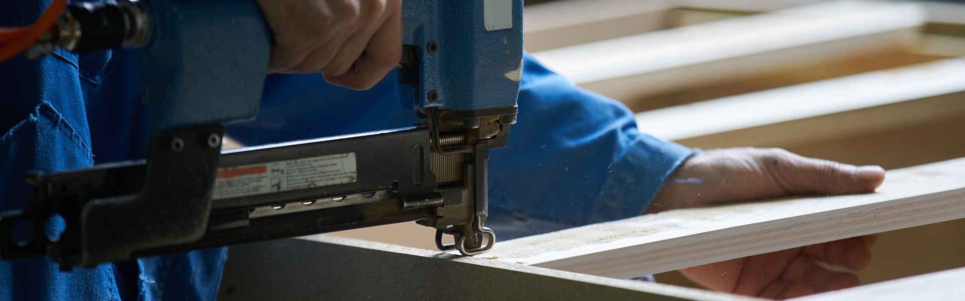 A man making furniture with beech and maple die boards