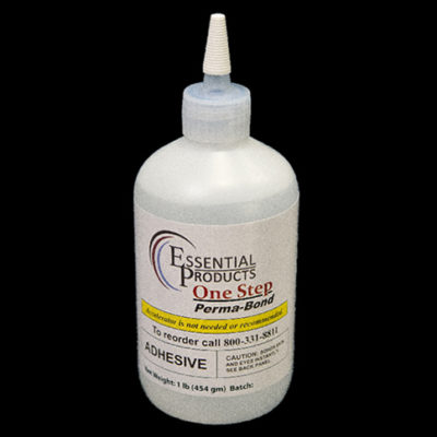 A bottle of low viscosity diemaking adhesive